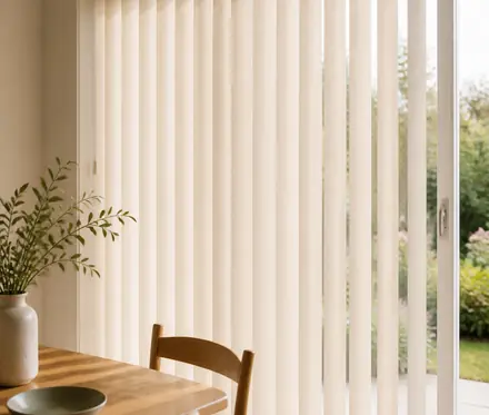 Vertical blinds fitted in a warm domestic room